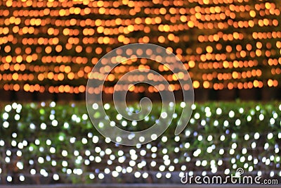 Colorful bokeh light night background two tone wall, gold and nature background blurred bokeh bright, texture lighting Stock Photo