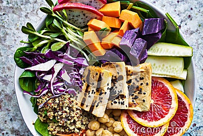 Colorful buddha bowl close up with grilled tofu Stock Photo