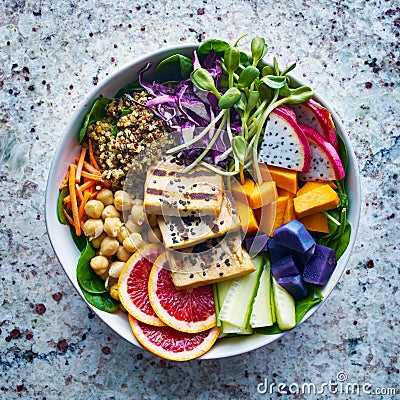 Colorful buddha bowl with grilled tofu and dragon fruit Stock Photo