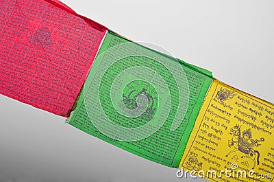 Colorful Buddhism prayer flags Dar Cho, lungta wth Buddism symbols. Stock Photo