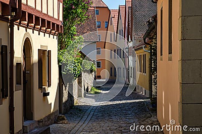 Colorful building in old street of Rothenburg ob der Tauber, Bavaria, Germany. Stock Photo