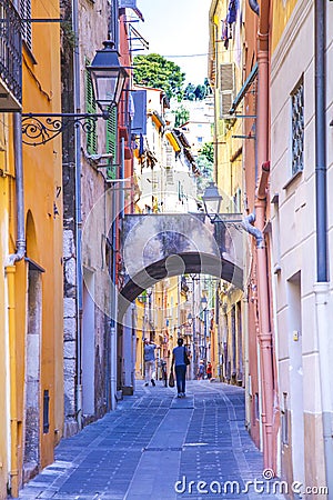 Colorful buildings in the mediaeval town of Menton, French Riviera, France. Editorial Stock Photo
