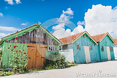 Colorful cabins on the port of the ChÃ¢teau d`OlÃ©ron Editorial Stock Photo