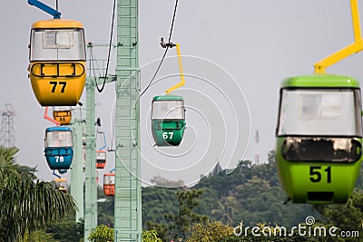 Colorful cable car hanging Stock Photo