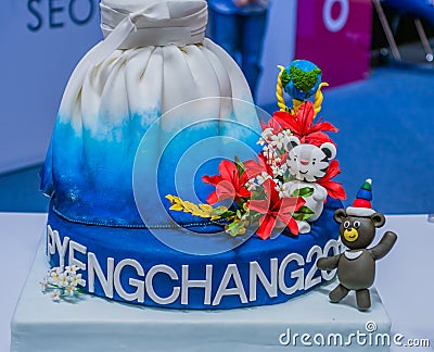 Colorful cake of with olympic mascots make of chocolate Editorial Stock Photo
