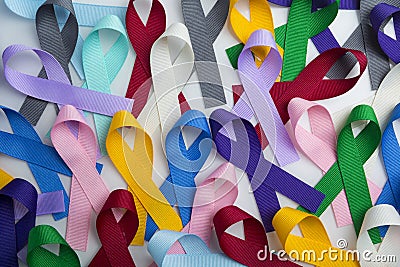 Multi colored cancer ribbon background. Proudly worn by patients, supporters and survivors for world cancer day. Bringing awarenes Stock Photo