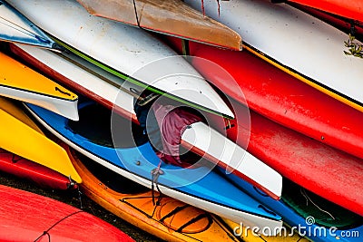 Colorful canoes stowed Stock Photo