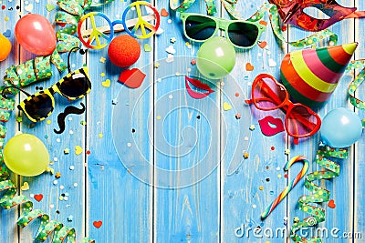 Colorful carnival frame on blue wood Stock Photo