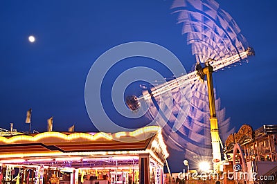 Colorful carnival fun fair at night Stock Photo