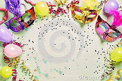 Colorful carnival masks and party balloons Stock Photo