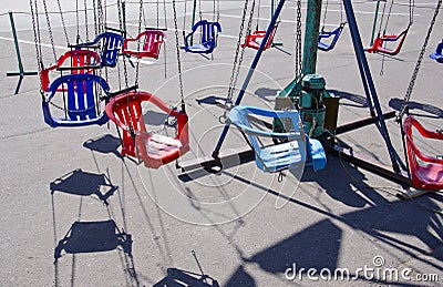 Colorful carousel chairs in the square Stock Photo