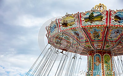 Carousel on cloudy sky background. Oktoberfest, Bavaria, Germany Stock Photo