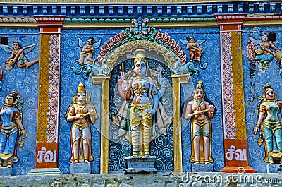 Colorful carved idols on the Gopuram, on the way to Thanjavur, Tamil Nadu, India Stock Photo