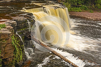 Colorful Cascade in the Wilds Stock Photo