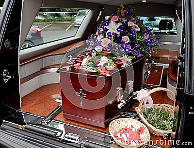 A colorful casket in a hearse or church before funeral Editorial Stock Photo