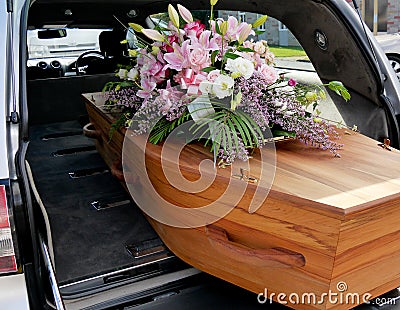 A colorful casket in a hearse or church before funeral Stock Photo