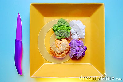 Colorful cauliflower and broccoli : purple, white, green, orange Stock Photo