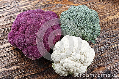 Colorful cauliflower on a wooden background Stock Photo