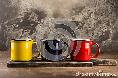 Colorful ceramic mugs Stock Photo