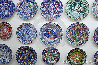 Colorful ceramic plates for sale in Turkey. Decorated tableware in the tourist store. souvenir shop Editorial Stock Photo