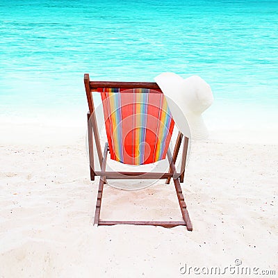 Colorful chair on white sand on a beautiful beach Stock Photo