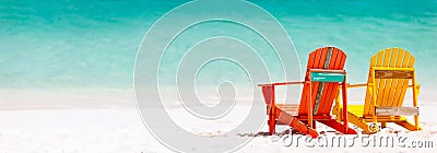 Colorful chairs on Caribbean beach Stock Photo