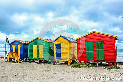 Colorful changing rooms in St James beach Cape Town Stock Photo