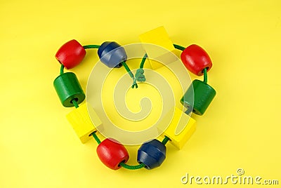 Colorful Childs Wooden Beads Heart Shape Stock Photo