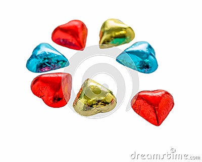 Colorful chocolate hearts on isolated white background Stock Photo