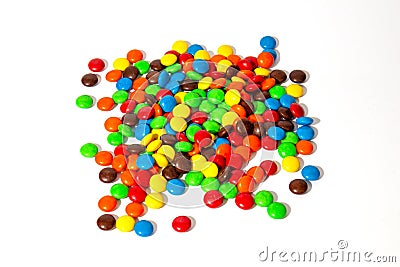 Colorful chocolate M&Ms in and out of focus on white background Stock Photo