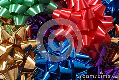 Colorful Christmas bows forming a vivid background Stock Photo