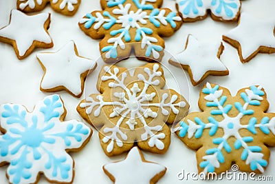 Colorful Christmas cookies in the form of snowflakes and stars Stock Photo