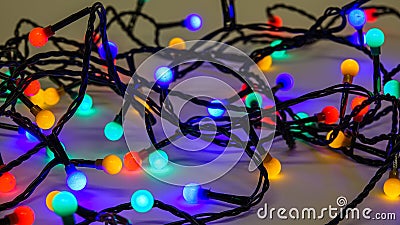 Colorful christmas lights. Messy tangled cables Stock Photo