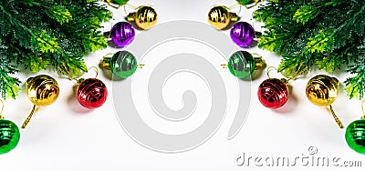 colorful Christmas frame or border. tree ornament and plastic cypress leaves in white background Stock Photo