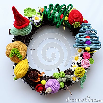 Colorful Christmas wreath handmade ornament for garland from pine tree, flower, fruit, leaf, wonderful craft decoration Stock Photo