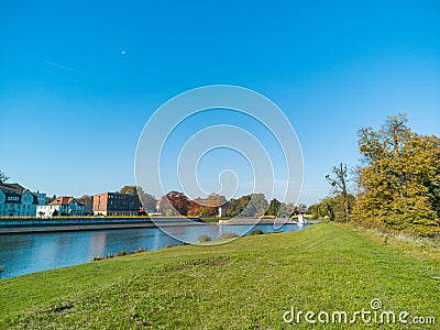 Colorful city fall landscape with buildings and river Stock Photo
