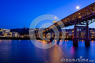 Colorful cityscape of Portland over Willamette river at twilight Editorial Stock Photo