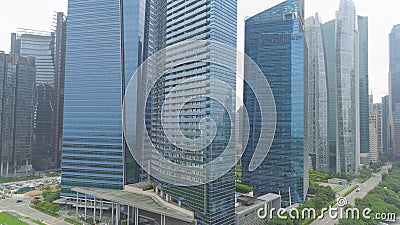 Colorful cityscape of Singapore from rooftop. Shot. Futuristic skyscrapers. Top view of the financial center of Editorial Stock Photo