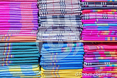 Colorful clothes in the cupboard. Stock Photo