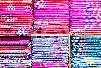 Colorful clothes in the cupboard. Stock Photo