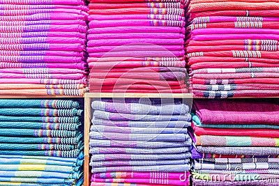 Colorful clothes in the cupboard. Stock Photo