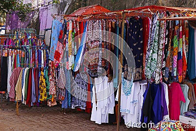 Colorful clothing items displayed by the shops in the streets in fort kochi Stock Photo