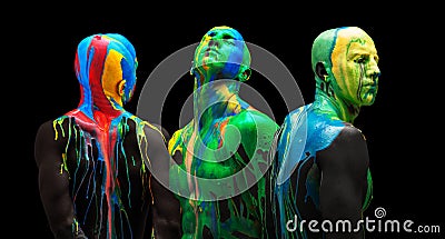 Colorful collage. Male body and face covered with multicolored paints isolated over black background Stock Photo