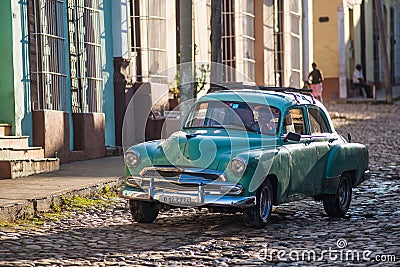 Colorful Colonial old town with classic car, building, cobblestone street in Trinidad, Cuba, America. Editorial Stock Photo