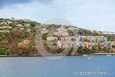 Colorful Condos on St Thomas with sailboats Stock Photo