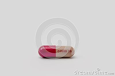 Colorful Covid 19 Corona Virus / Sars-cov-2 pill isolated on white background with copy space Medication for prevention, Stock Photo