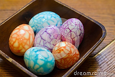 Colorful cracked design Easter Eggs in Bowl Stock Photo