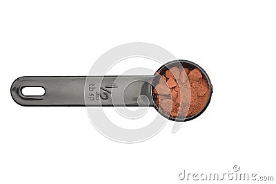 Cacao powder in measuring spoon on white background Stock Photo