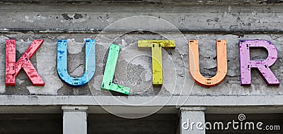 Colorful culture - The German word `Kultur` culture on an old building Stock Photo