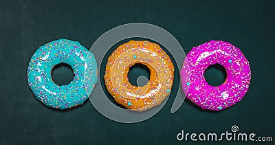 Colorful donuts assorted donuts with chocolate frosted, pink glazed and sprinkles donuts Stock Photo